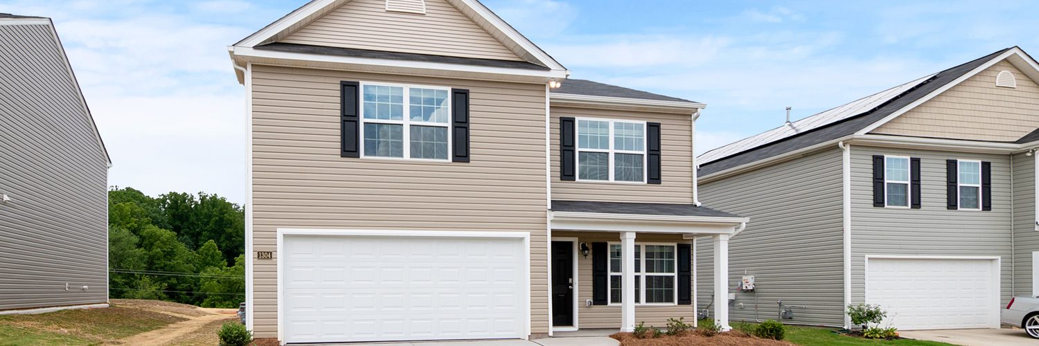 House exterior with freshly painted siding and trim